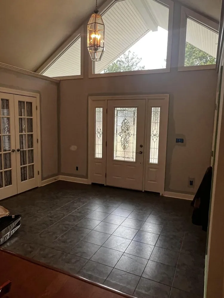 Slide of Asher Handyman and Restoration