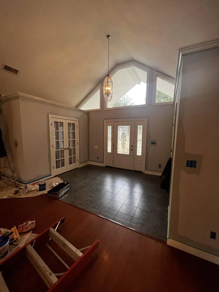 Slide of Asher Handyman and Restoration