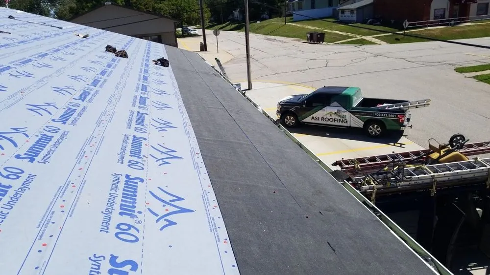 Slide of ASI Roofing