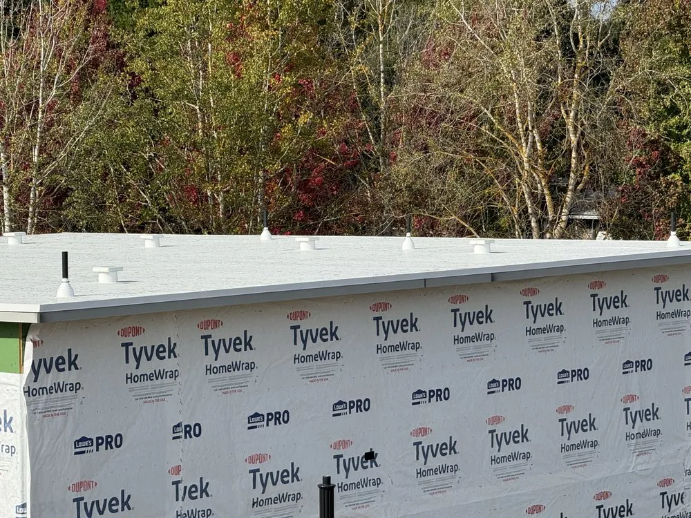 Slide of Aslan Roofing