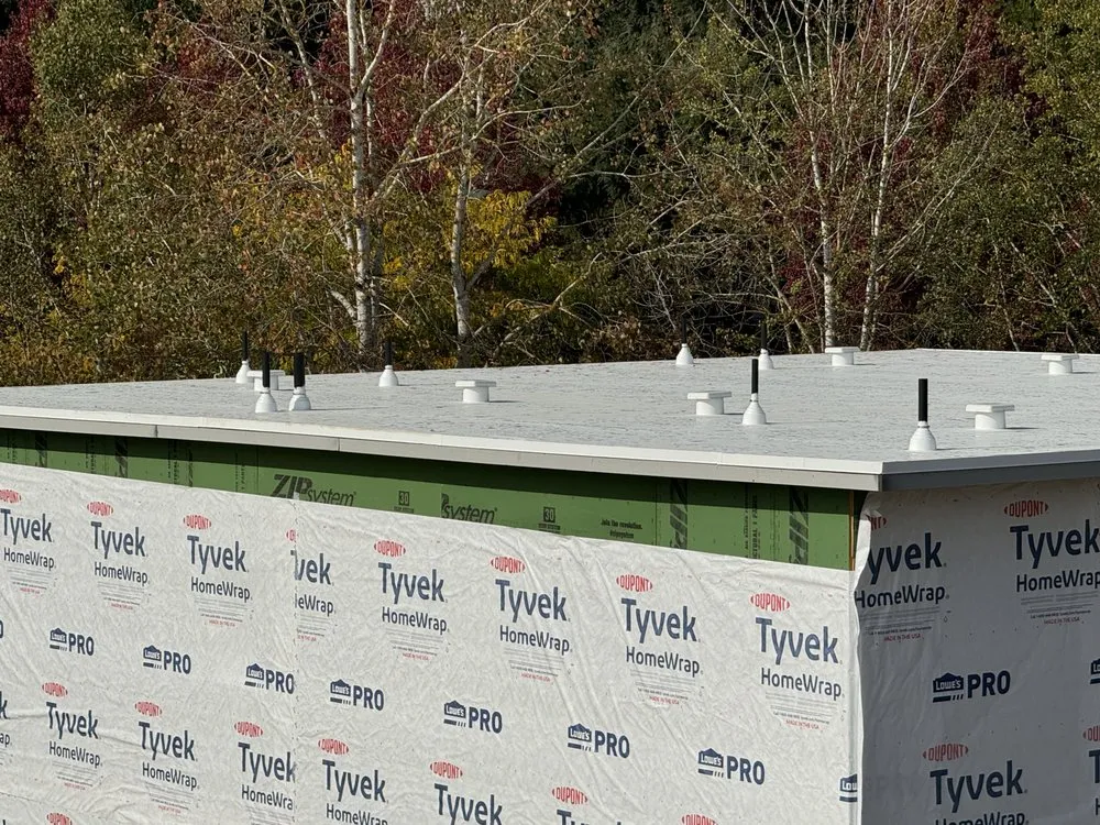 Slide of Aslan Roofing