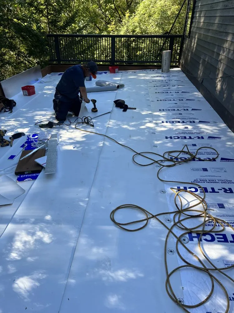 Slide of Aslan Roofing