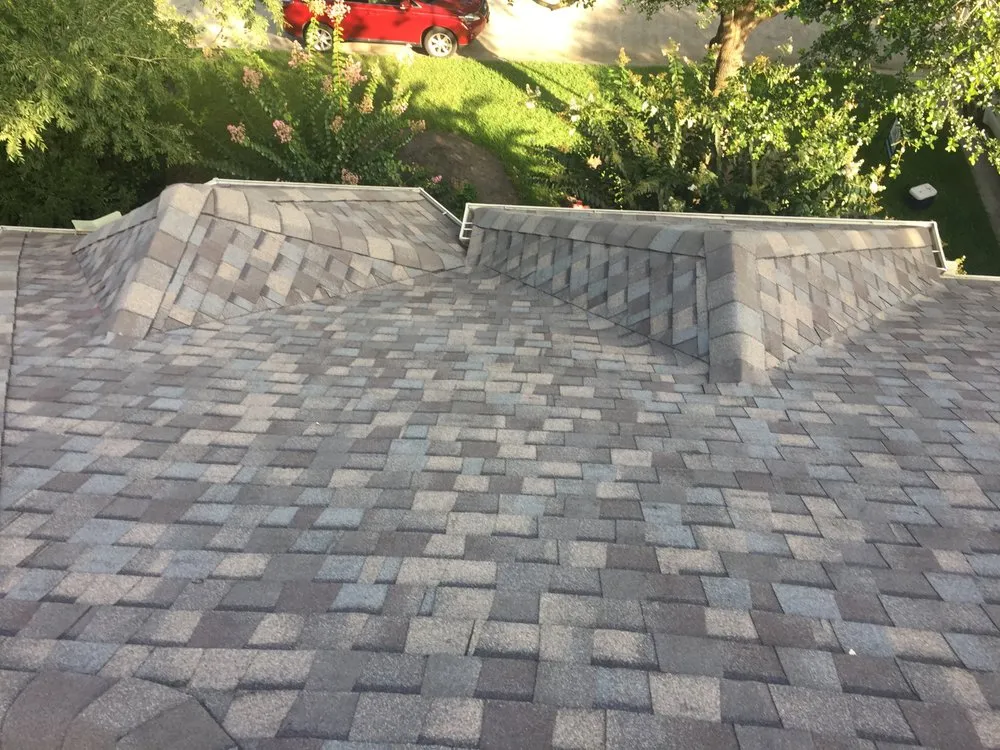 Slide of ASM Roofing Pros