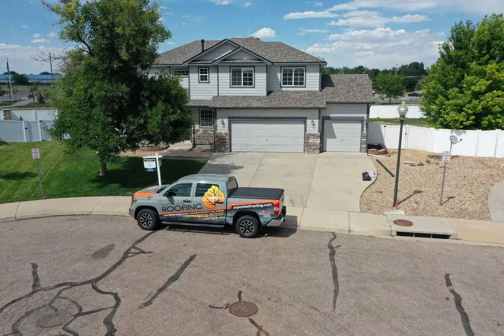 Slide of Aspen Leaf Roofing