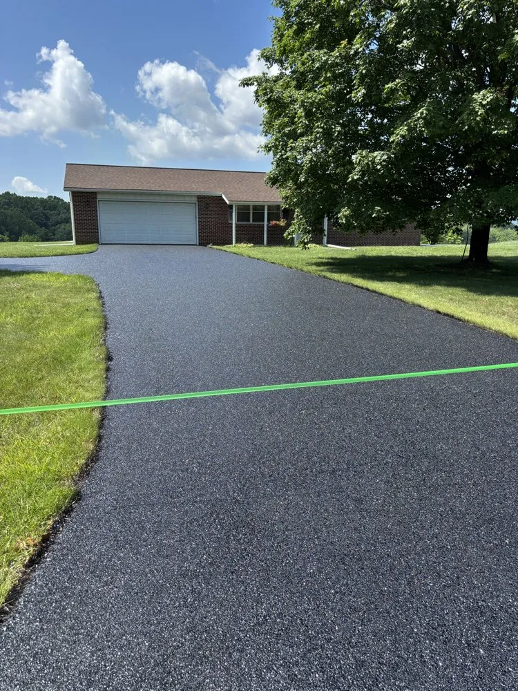 Slide of Asphalt Sealing By John Johnston And Son