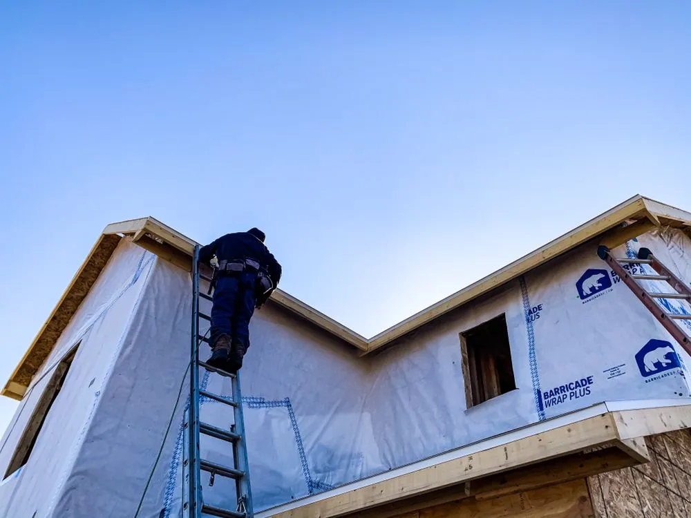 Slide of Asscher Roofing