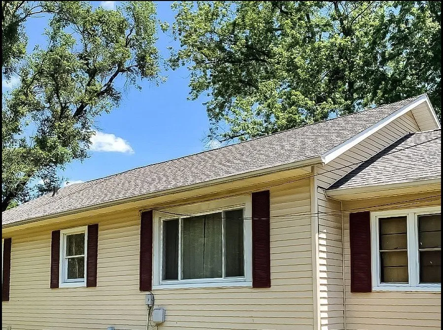 Slide of Asscher Roofing