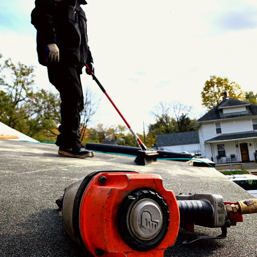 Slide of Asscher Roofing