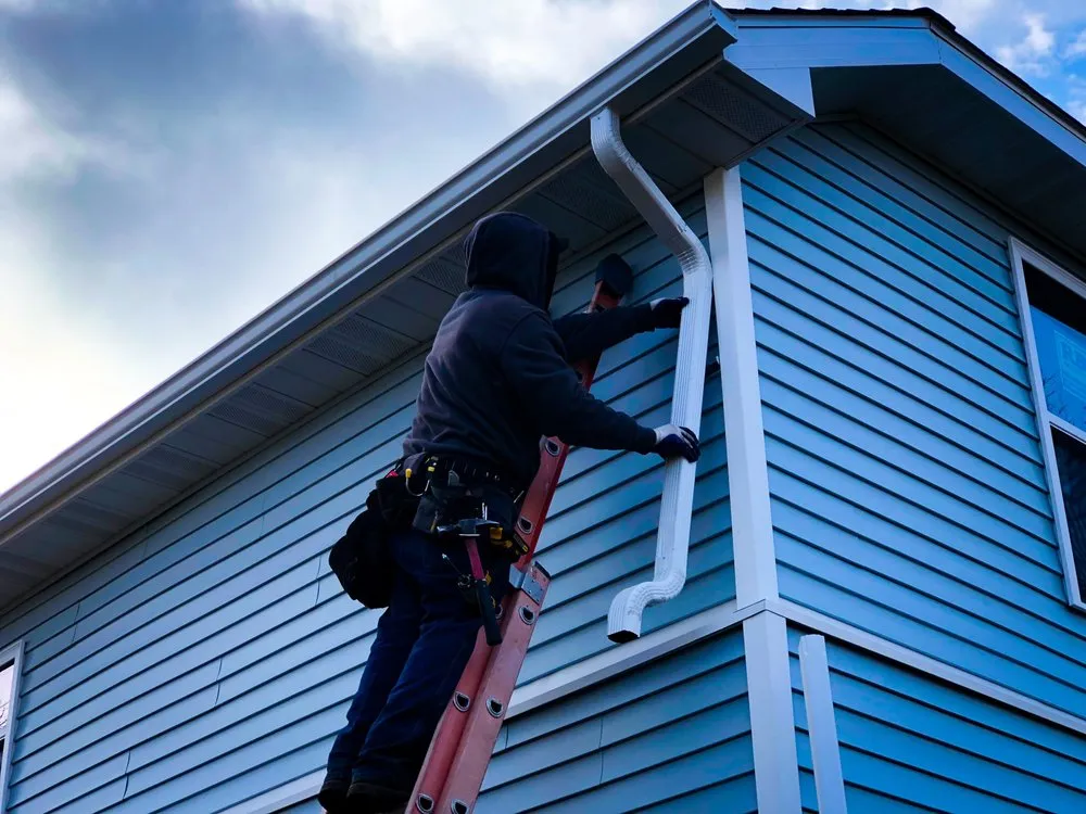 Slide of Asscher Roofing