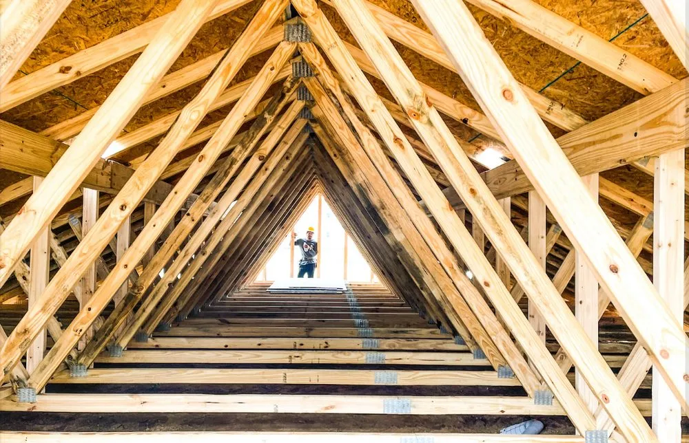 Slide of Asscher Roofing