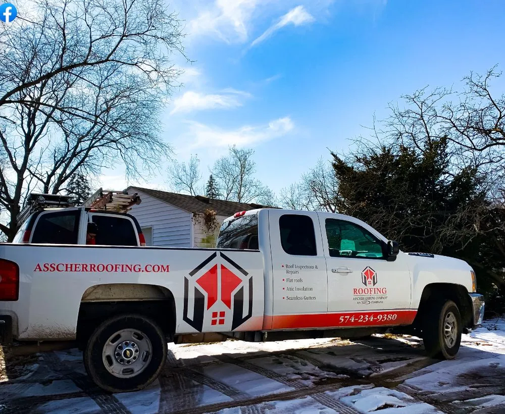 Slide of Asscher Roofing