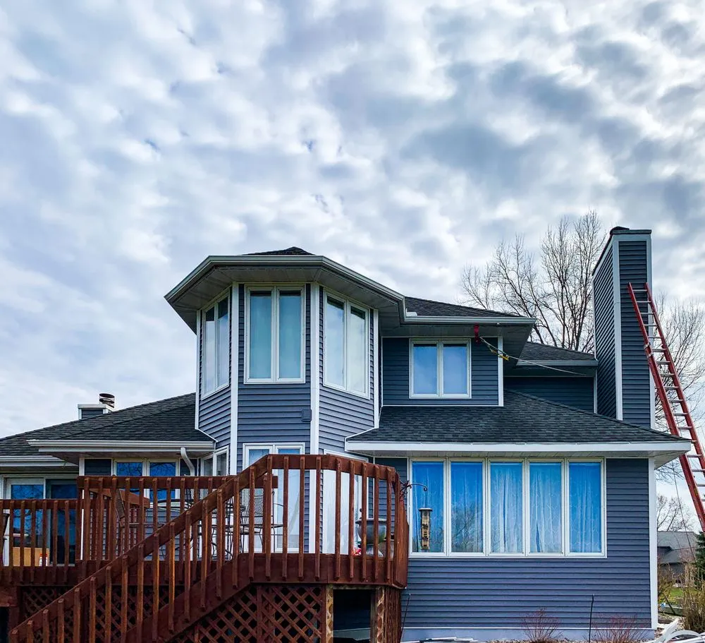 Slide of Asscher Roofing