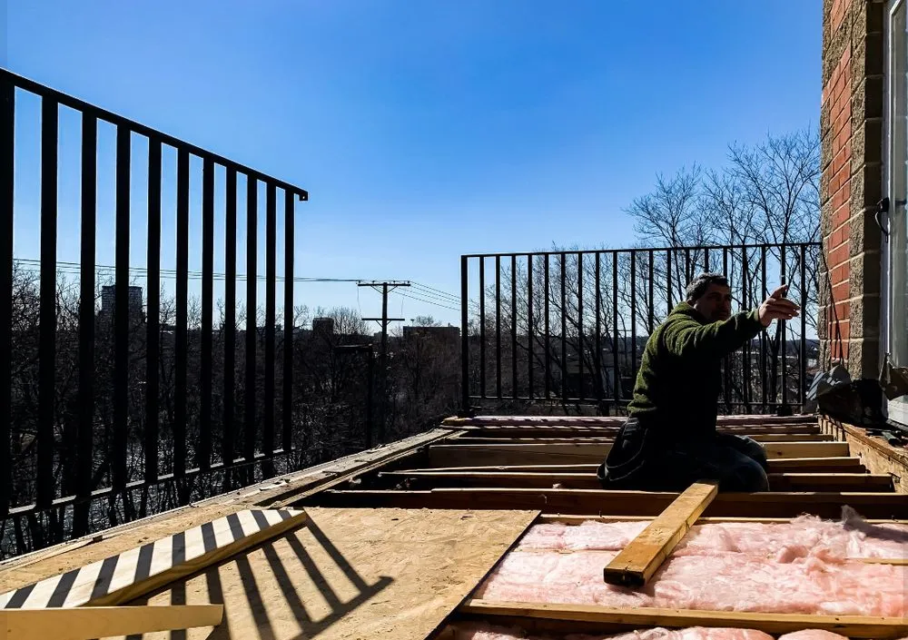 Slide of Asscher Roofing