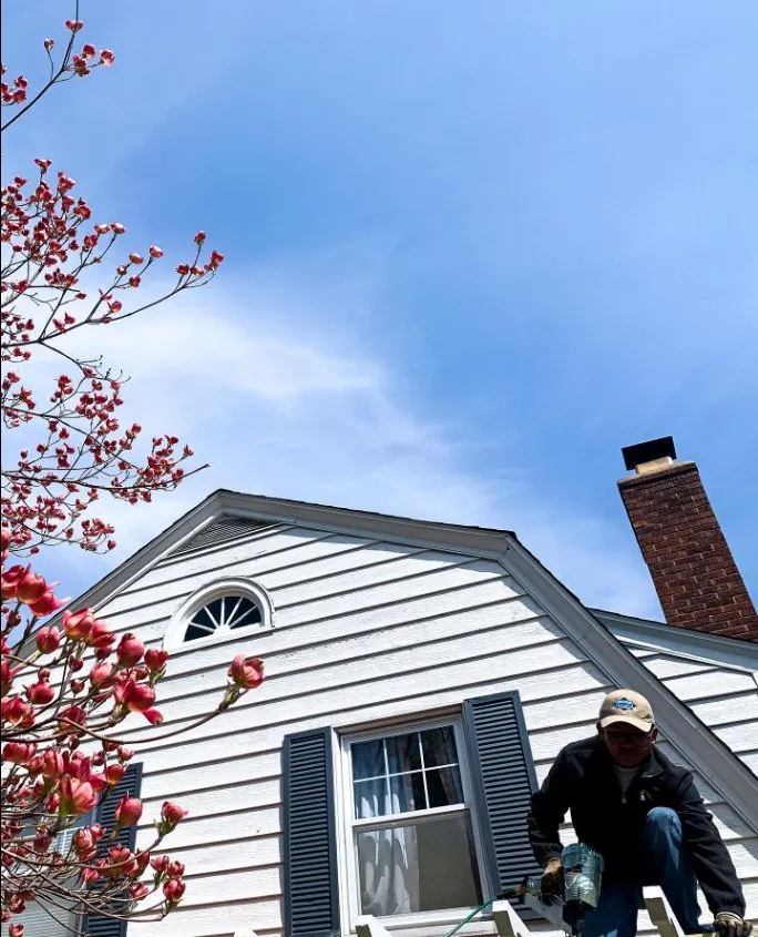 Slide of Asscher Roofing