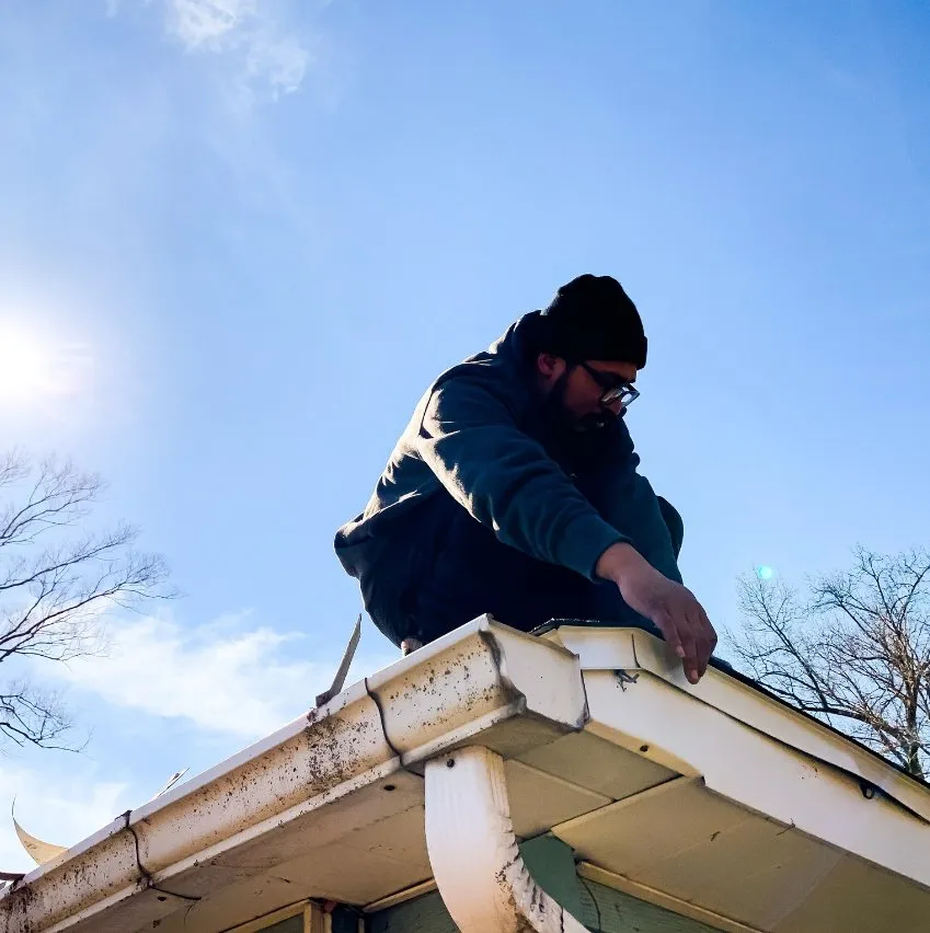 Slide of Asscher Roofing