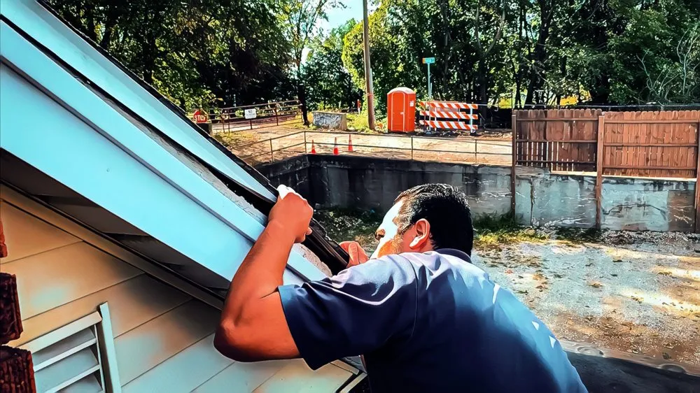 Slide of Asscher Roofing