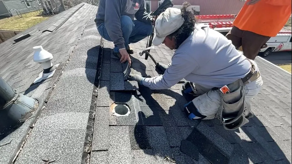 Slide of Asscher Roofing