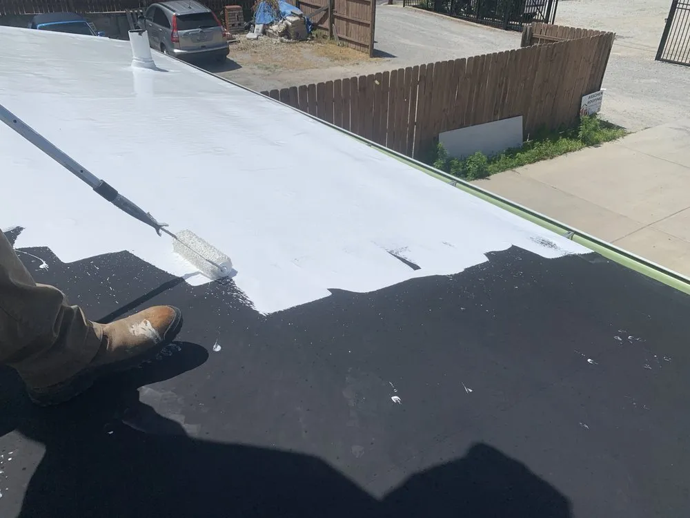 Slide of Asscher Roofing