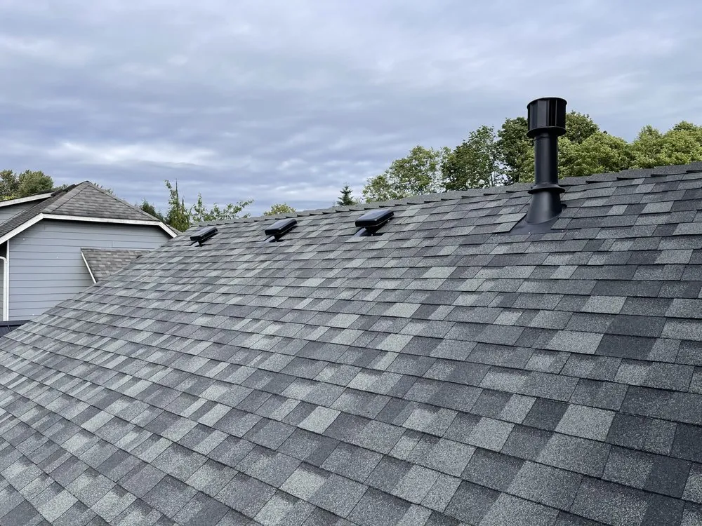 Slide of Asset Roofing Company