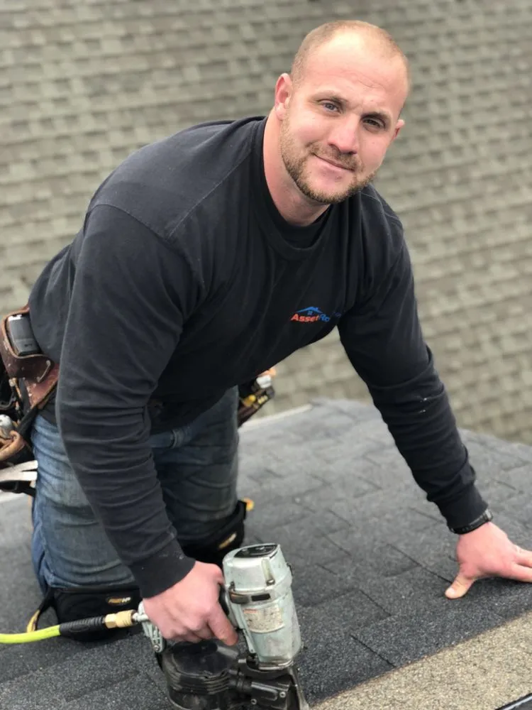 Slide of Asset Roofing Company