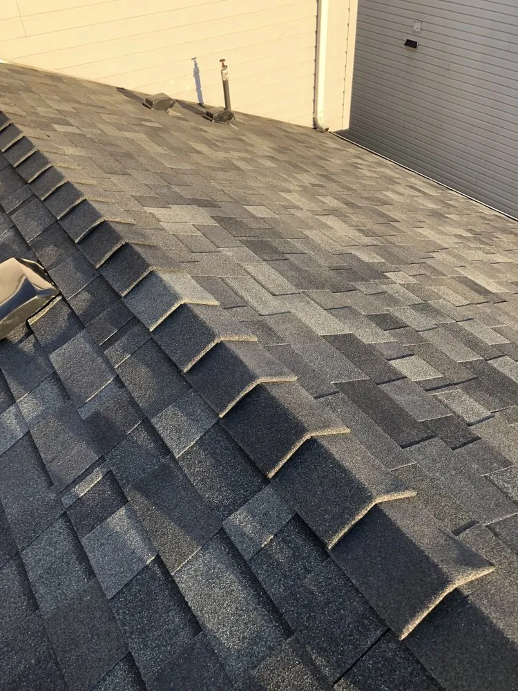 Slide of Asset Roofing Company