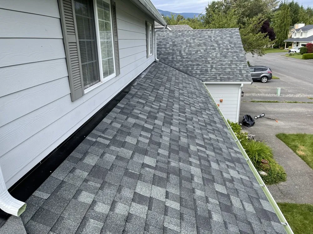 Slide of Asset Roofing Company