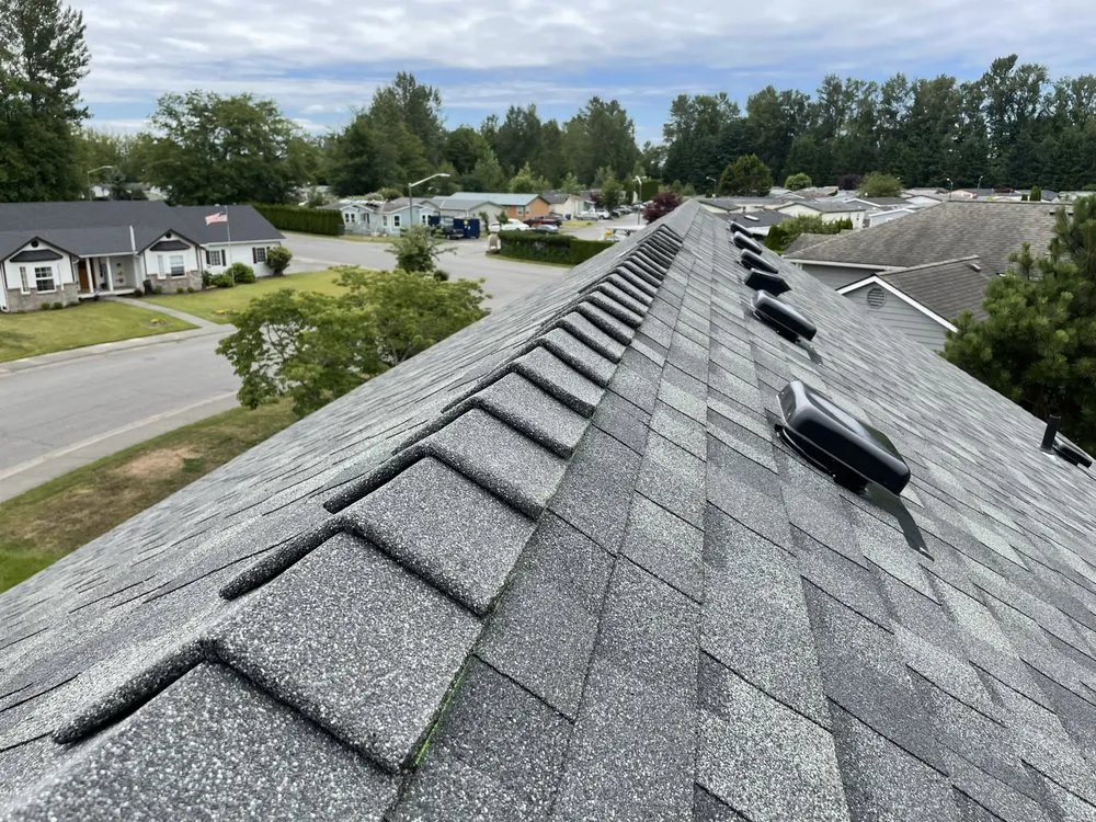 Slide of Asset Roofing Company