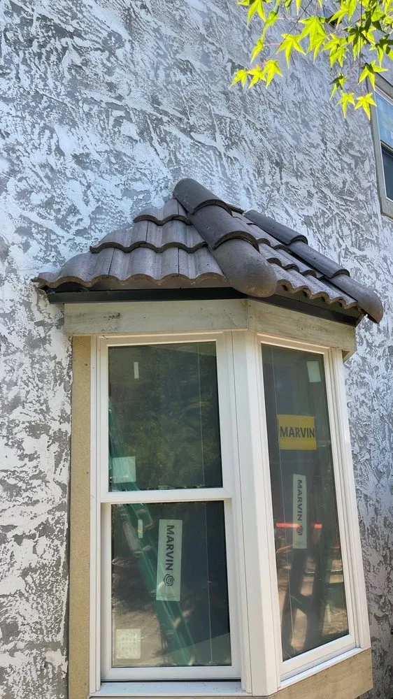 Slide of Assurance Roofing Company