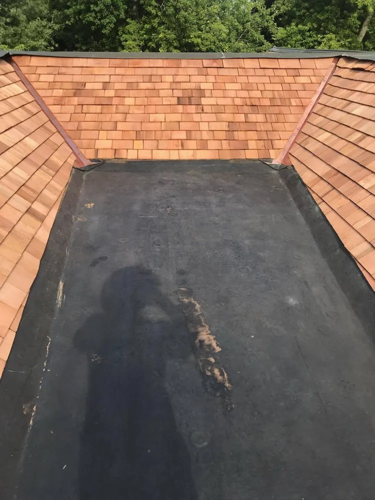 Slide of Assurance Roofing