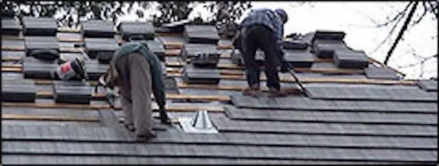 Slide of Assured Roofing