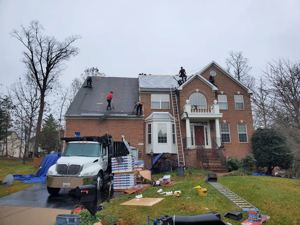 Slide of AST Roofing & Consulting