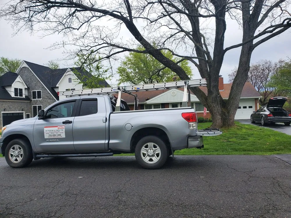 Slide of AST Roofing & Consulting