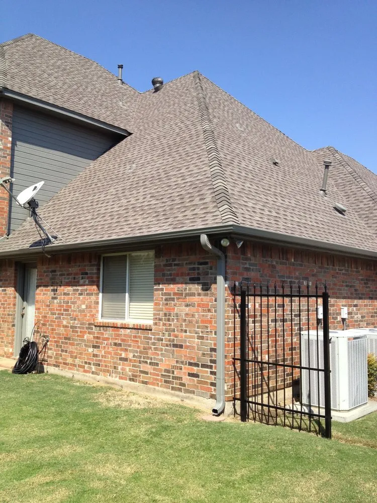 Slide of Astro Roofing