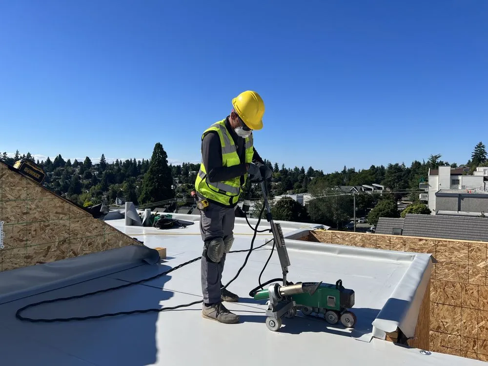 Slide of Astro Roofing