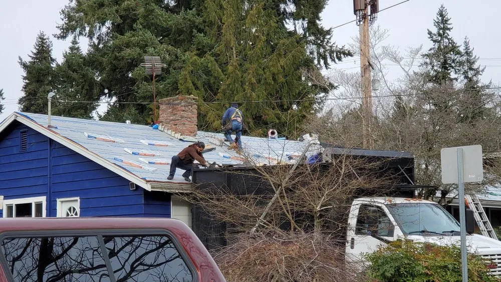 Slide of Astro Roofing