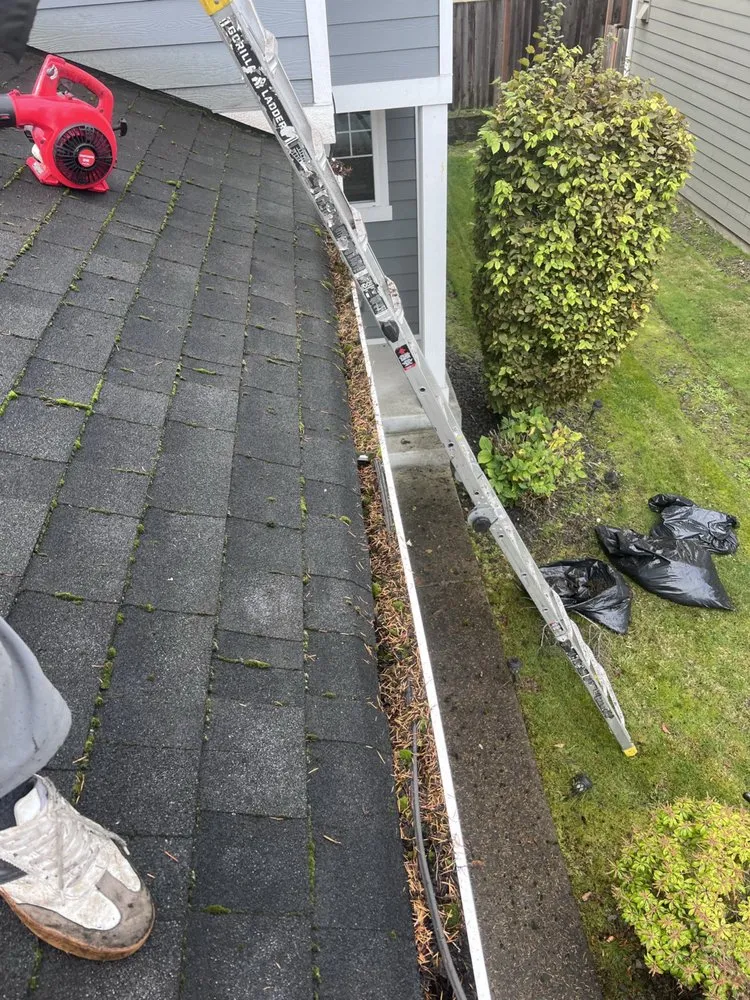 Slide of Astro Roofing