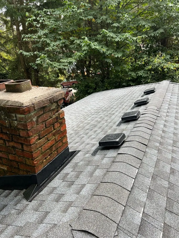 Slide of Astro Roofing