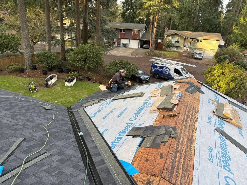 Slide of Astro Roofing