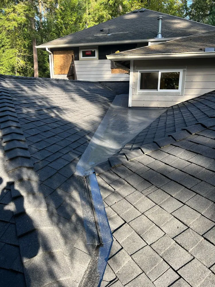 Slide of Astro Roofing