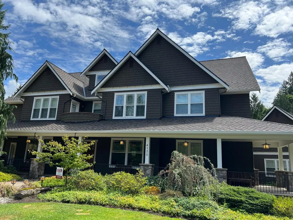 Slide of Astro Roofing