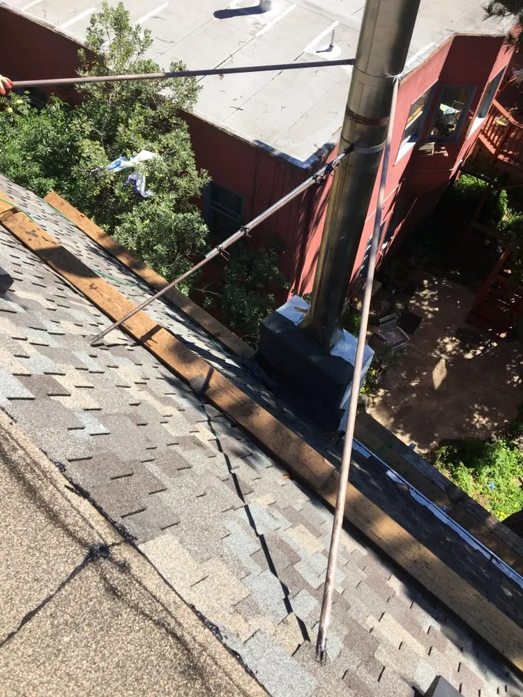 Slide of Astro Roofing