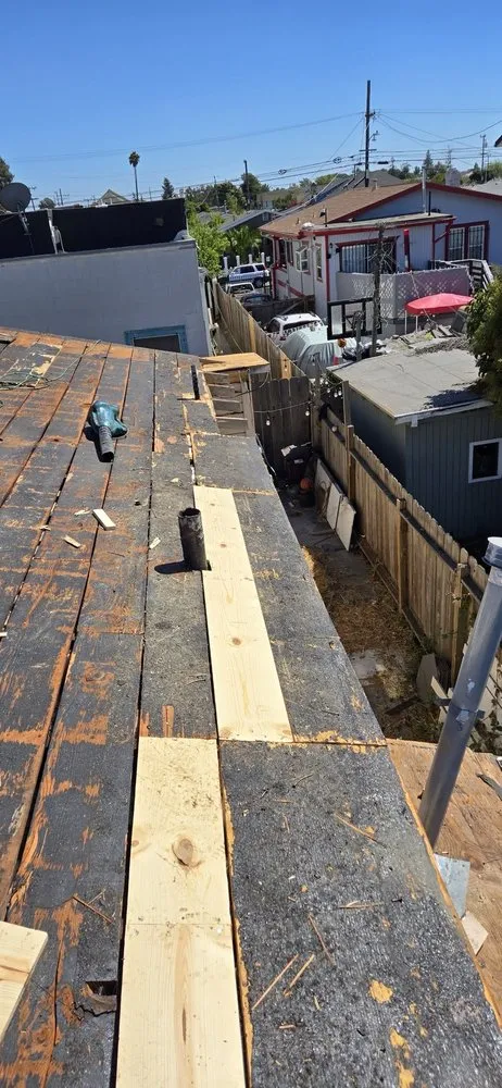 Slide of Astro Roofing