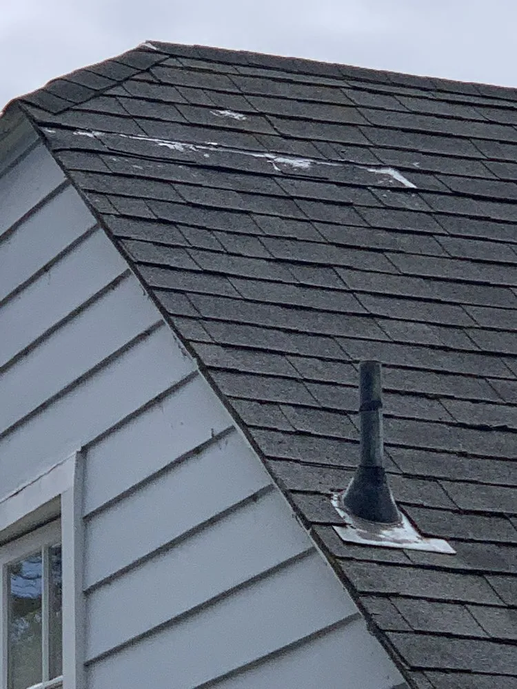 Slide of Astro Roofing