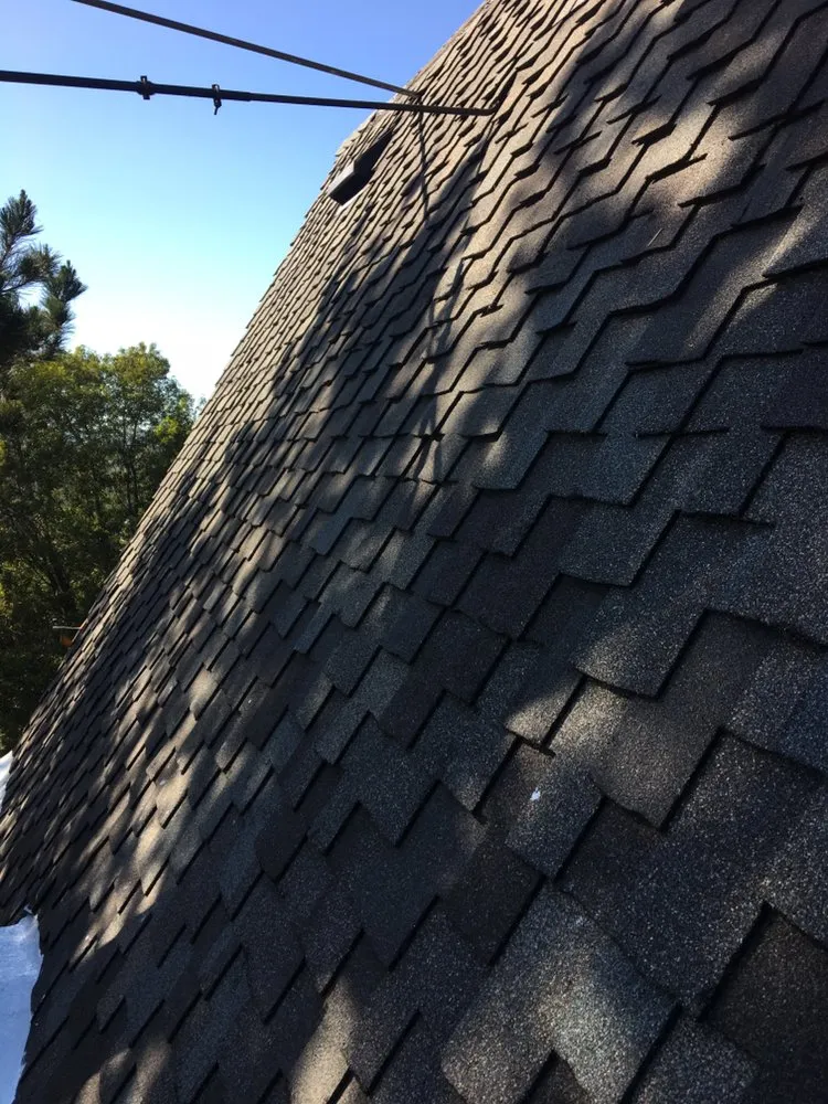 Slide of Astro Roofing