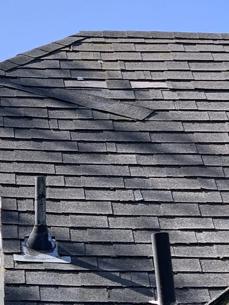 Slide of Astro Roofing