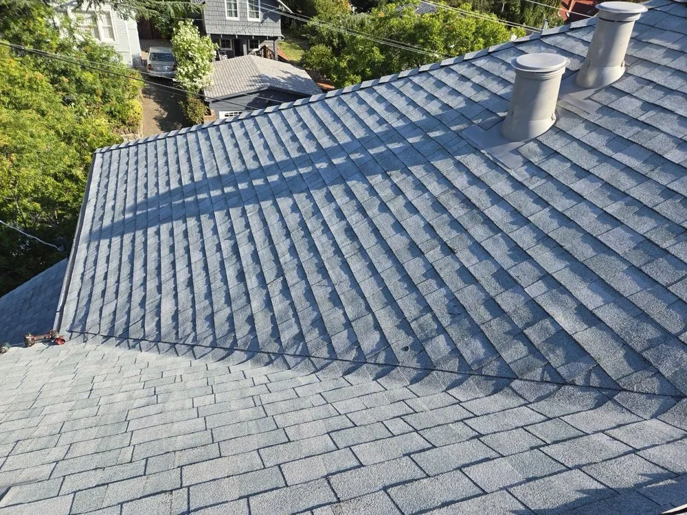 Slide of Astro Roofing