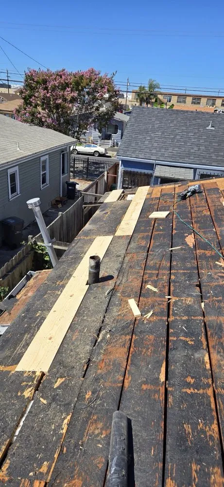 Slide of Astro Roofing