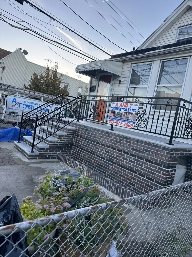 Slide of A&T Construction