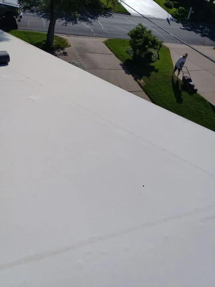 Slide of AT Max Roofing