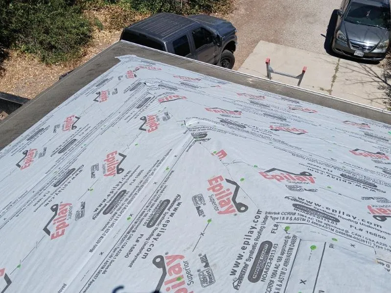 Slide of AT Max Roofing